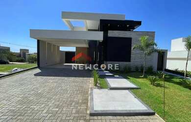 Imagem: A casa possui 3 Dormitórios, 4 Banheiros, 4 Vagas na garagem