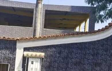 Imagem: A casa possui 2 Dormitórios, 4 Banheiros, 3 Vagas na garagem