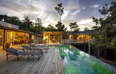 Imagem: A casa possui 5 Dormitórios, 5 Banheiros, 2 Vagas na garagem