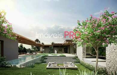 Imagem: A casa possui 5 Dormitórios, 5 Banheiros, 5 Vagas na garagem