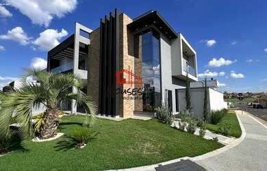 Imagem: A casa em condomínio possui 4 Dormitórios, 5 Banheiros, 4