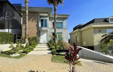 Imagem: A casa em condomínio possui 4 Dormitórios, 5 Banheiros, 4