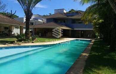 Imagem: A casa em condomínio possui 5 Dormitórios, 5 Banheiros, 3