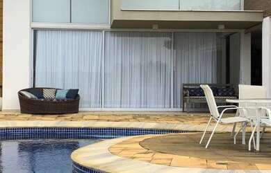 Imagem: A casa em condomínio possui 5 Dormitórios, 5 Banheiros, 5