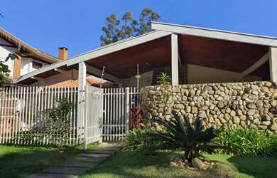 Imagem: A casa em condomínio possui 4 Dormitórios, 5 Banheiros, 4