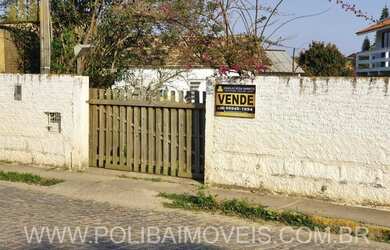 Imagem: A casa possui 3 Dormitórios, 1 Banheiro, 56m² de Área e