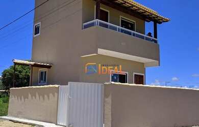 Imagem: A casa possui 2 Dormitórios, 1 Banheiro, 2 Vagas na garagem