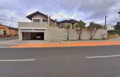 Imagem: A casa possui 1 Dormitório, 5 Banheiros, 4 Vagas na garagem