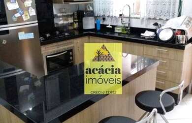 Imagem: A casa possui 3 Dormitórios, 2 Banheiros, 2 Vagas na garagem