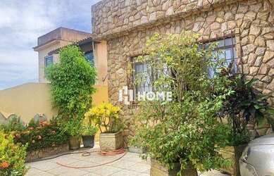 Imagem: A casa possui 4 Dormitórios, 4 Banheiros, 2 Vagas na garagem