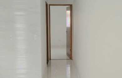 Imagem: A casa possui 2 Dormitórios, 2 Banheiros e 61m² de Área e