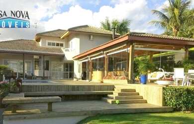 Imagem: A casa em condomínio à venda possui 4 Dormitórios, 5 Banheiros