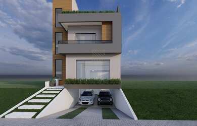 Imagem: A casa possui 3 Dormitórios, 2 Banheiros, 4 Vagas na garagem