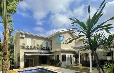 Imagem: A casa em condomínio possui 4 Dormitórios, 5 Banheiros, 4