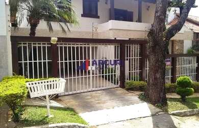 Imagem: A casa possui 4 Dormitórios, 4 Banheiros, 4 Vagas na garagem