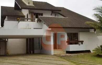 Imagem: A casa em condomínio possui 4 Dormitórios, 5 Banheiros, 4