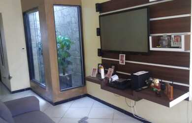 Imagem: A casa possui 2 Dormitórios, 1 Banheiro, 1 Vaga na garagem