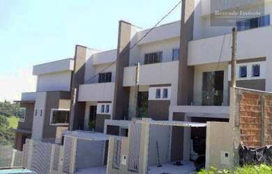 Imagem: A casa possui 3 Dormitórios, 3 Banheiros, 4 Vagas na garagem