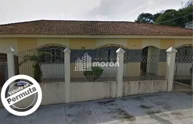 Imagem: A casa possui 3 Dormitórios, 2 Banheiros, 1 Vaga na garagem