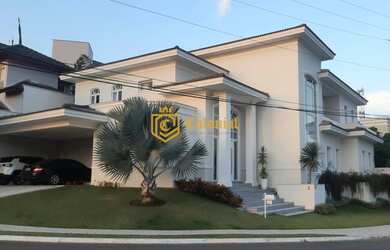 Imagem: A casa em condomínio possui 5 Dormitórios, 5 Banheiros, 3