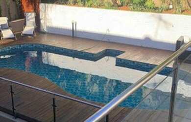 Imagem: A casa em condomínio possui 4 Dormitórios, 5 Banheiros, 4