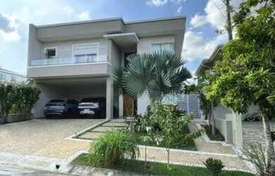 Imagem: A casa em condomínio possui 4 Dormitórios, 5 Banheiros, 4