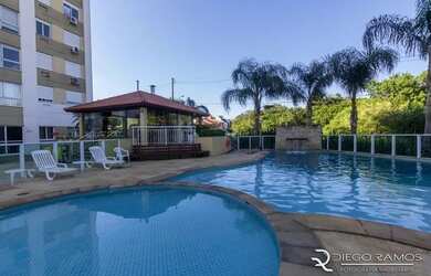 Imagem: O apartamento possui 3 Dormitórios, 1 Banheiro, 1 Vaga na garagem