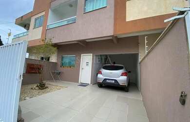 Imagem: A casa possui 3 Dormitórios, 2 Banheiros, 2 Vagas na garagem