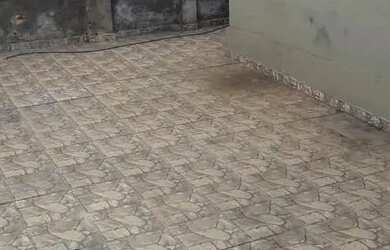 Imagem: A casa possui 3 Dormitórios, 1 Banheiro, 1 Vaga na garagem