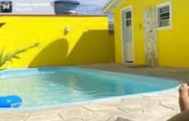 Imagem: A casa possui 3 Dormitórios, 2 Banheiros, 2 Vagas na garagem