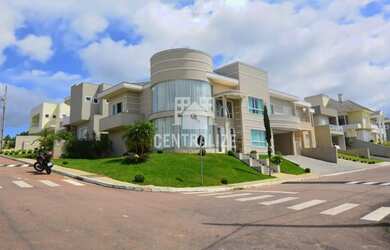 Imagem: A casa em condomínio possui 3 Dormitórios, 4 Banheiros, 2