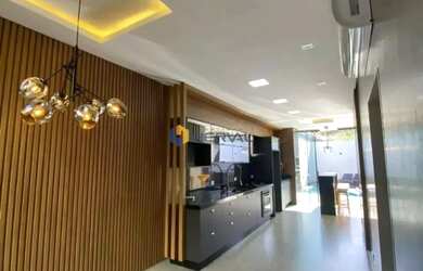 Imagem: A casa possui 3 Dormitórios, 3 Banheiros, 3 Vagas na garagem