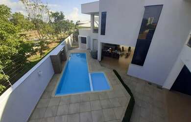 Imagem: A casa possui 5 Dormitórios, 5 Banheiros, 5 Vagas na garagem