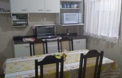 Imagem: A casa possui 5 Dormitórios, 4 Banheiros, 2 Vagas na garagem