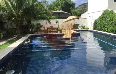 Imagem: A casa em condomínio possui 4 Dormitórios, 4 Banheiros, 1