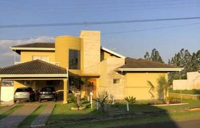 Imagem: A casa em condomínio à venda possui 4 Dormitórios, 3 Banheiros