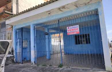 Imagem: A casa possui 2 Dormitórios, 1 Banheiro, 2 Vagas na garagem