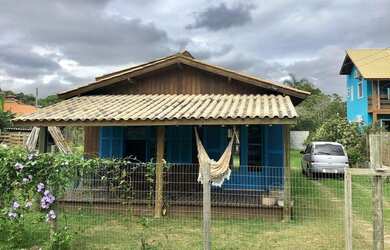 Imagem: A casa possui 4 Dormitórios, 3 Banheiros, 540m² de Área e