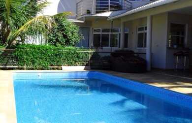 Imagem: A casa em condomínio possui 4 Dormitórios, 4 Banheiros, 4