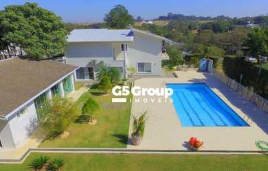 Imagem: A casa em condomínio possui 4 Dormitórios, 5 Banheiros, 5