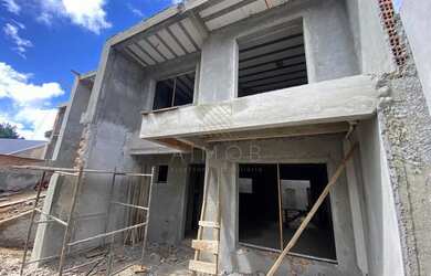 Imagem: A casa possui 3 Dormitórios, 2 Banheiros, 2 Vagas na garagem