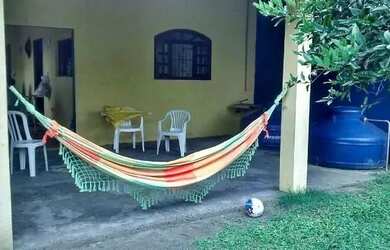 Imagem: A casa possui 3 Dormitórios, 5 Vagas na garagem e está localizado