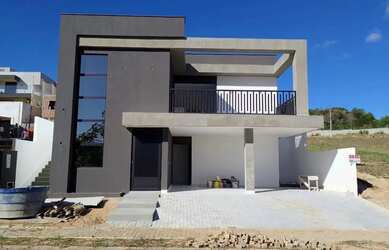 Imagem: A casa em condomínio possui 3 Dormitórios, 4 Banheiros, 390m²