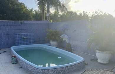 Imagem: A casa possui 4 Dormitórios, 4 Banheiros, 3 Vagas na garagem