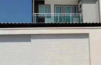 Imagem: A casa possui 3 Dormitórios, 4 Banheiros, 3 Vagas na garagem