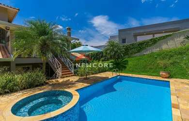 Imagem: A casa em condomínio possui 4 Dormitórios, 5 Banheiros, 4