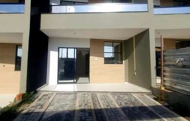 Imagem: A casa possui 3 Dormitórios, 3 Banheiros, 3 Vagas na garagem