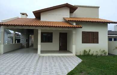 Imagem: A casa possui 2 Dormitórios, 2 Banheiros, 1 Vaga na garagem