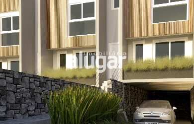 Imagem: A casa possui 3 Dormitórios, 1 Banheiro, 2 Vagas na garagem