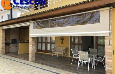 Imagem: A casa em condomínio possui 4 Dormitórios, 5 Banheiros, 5